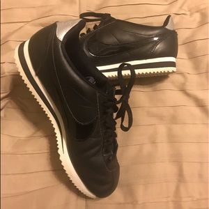Black and patent Nike Cortez